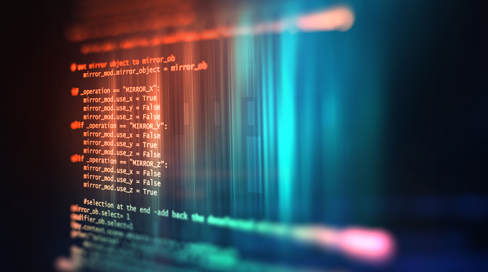 Close-up of computer screen with colorful html code with selective focus effect