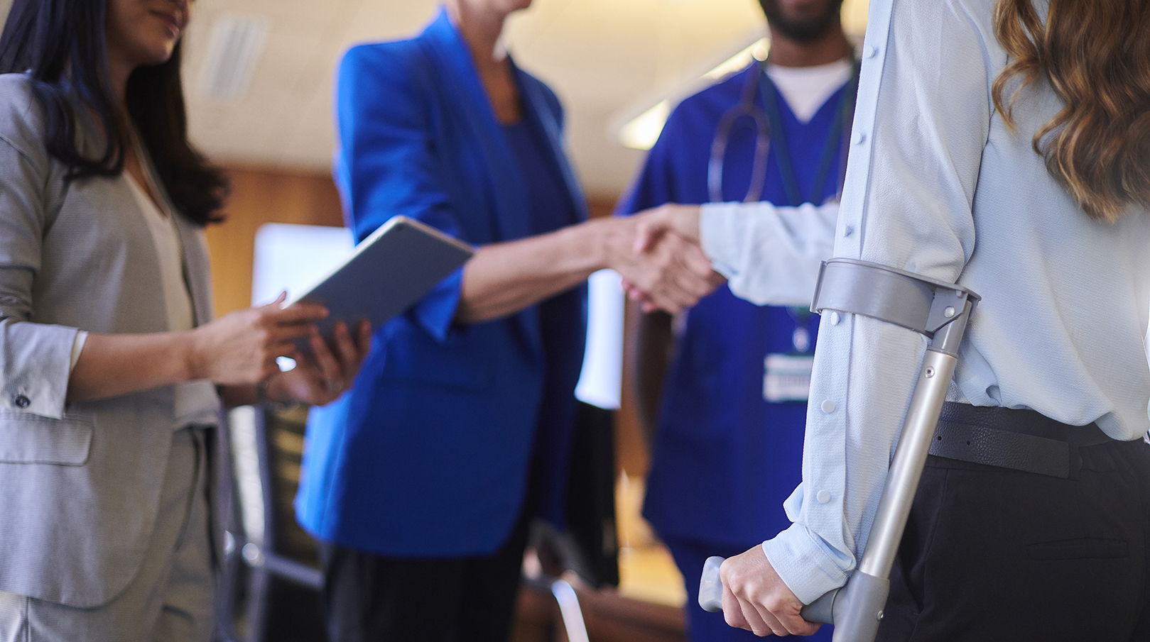 Medical professionals asses a workplace injury